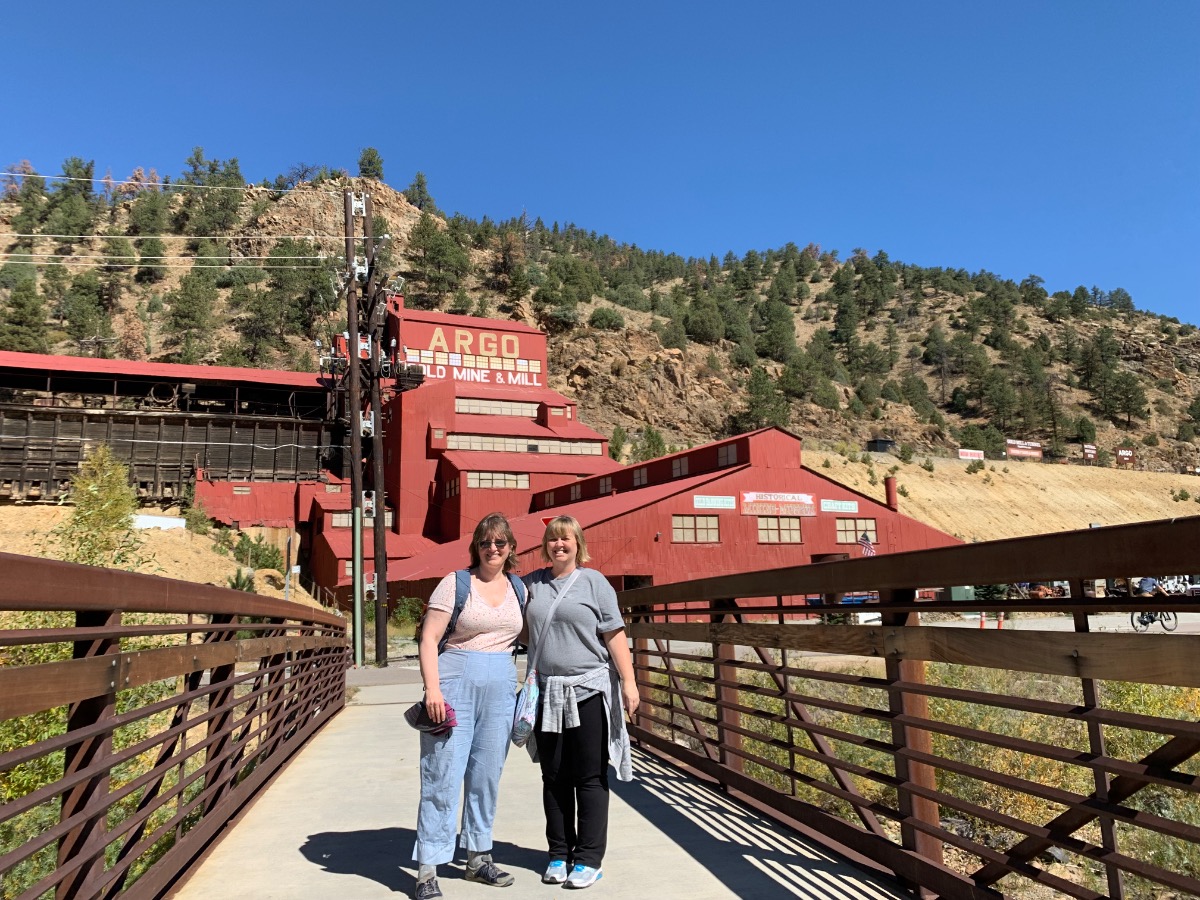 two women in front of Argo mine