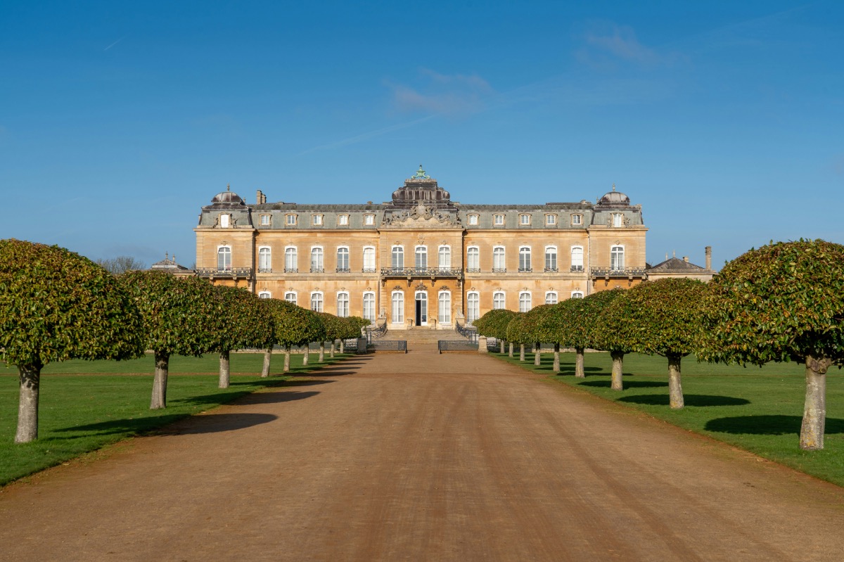 wide allee towards manor house