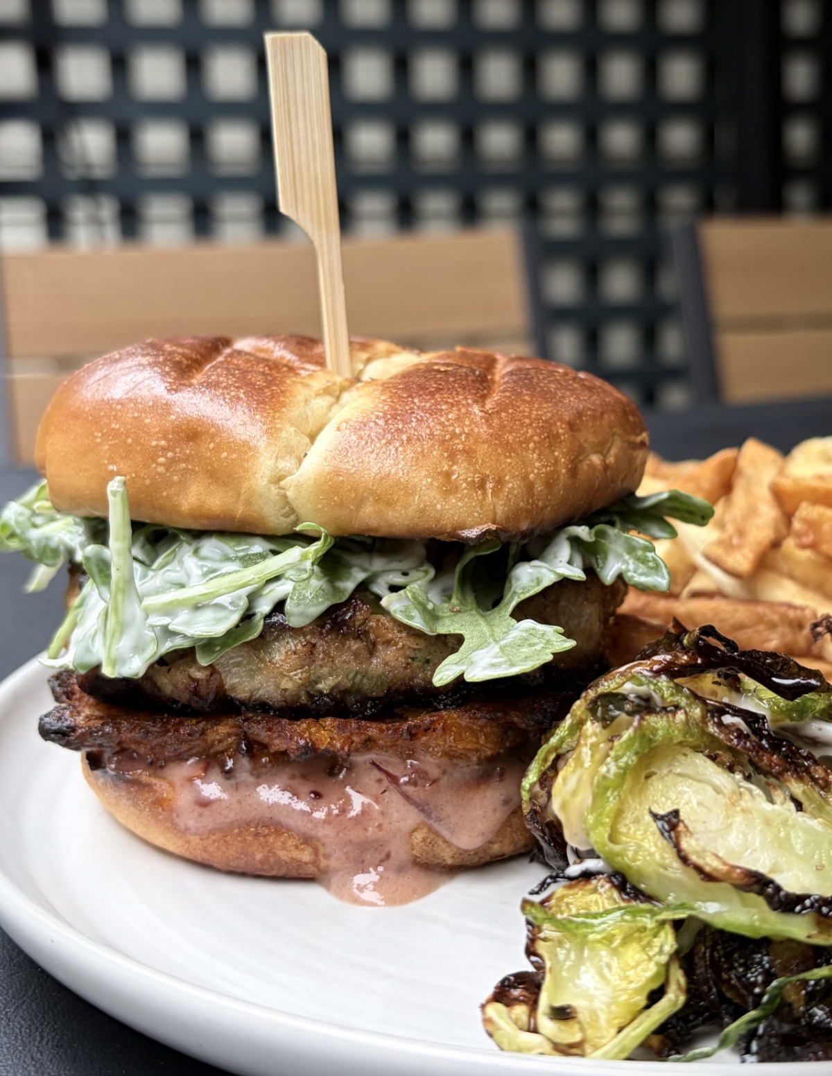 Turkey Harvest Burger 2.0 served with brussel sprouts, hand-cut fries and turkey gravy